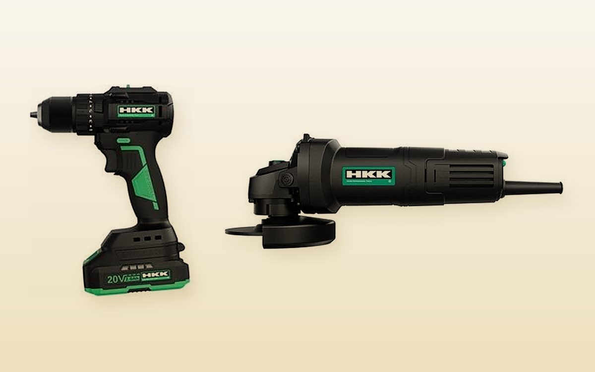 Cordless brushless drill next to a corded angle grinder